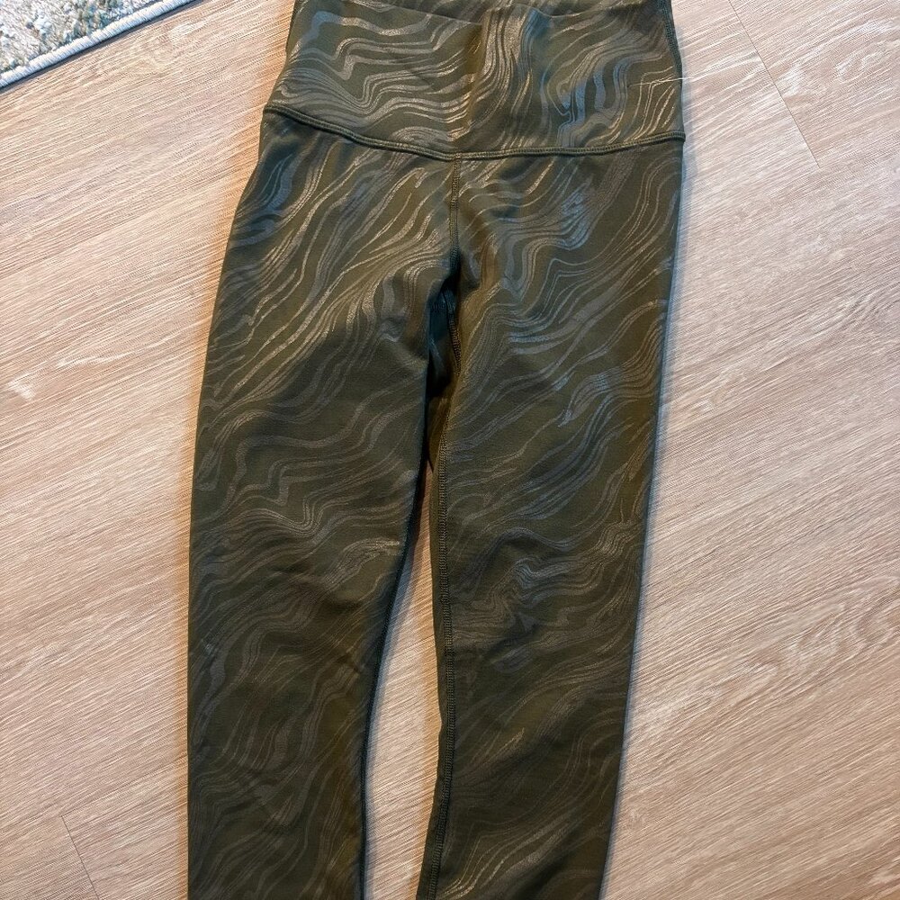 fabletics tights size med in kids, pattern green